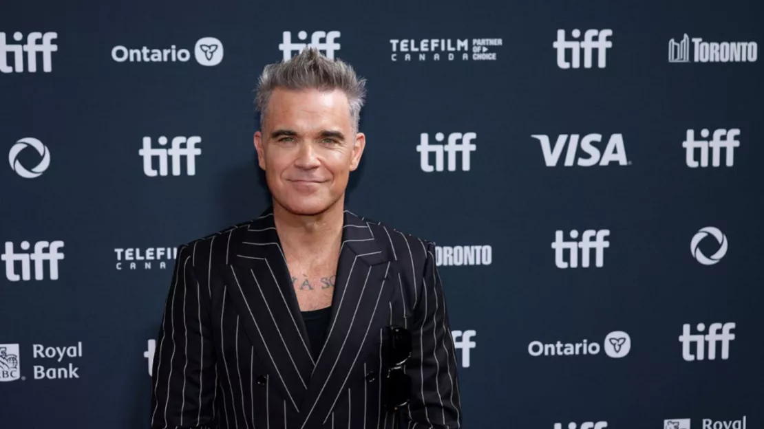 Robbie Williams sur le singe de son biopic : "je ne me considère pas comme un individu évolué"